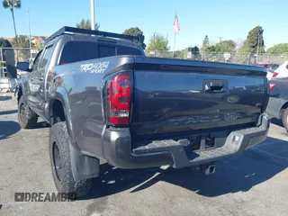 2021 Toyota Tacoma 4WD SR5 with VIN 3TMDZ5BNXMM107525, listed as a IAAI auction lot 41062698 with 41,771 mi miles. Bid and sale history available at carsss.com. Image 3.