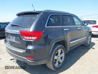 2013 Jeep Grand Cherokee Overland with VIN 1C4RJECT8DC534021, listed as a IAAI auction lot 42058374 with 137,289 mi miles. Bid and sale history available at carsss.com. Image 4.