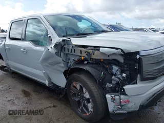 2023 Ford F-150 Lightning Pro with VIN 1FTVW1EV3PWG60491, listed as a IAAI auction lot 41507485 with 19,148 mi miles and . Bid and sale history available at DreamBid. Image 6.