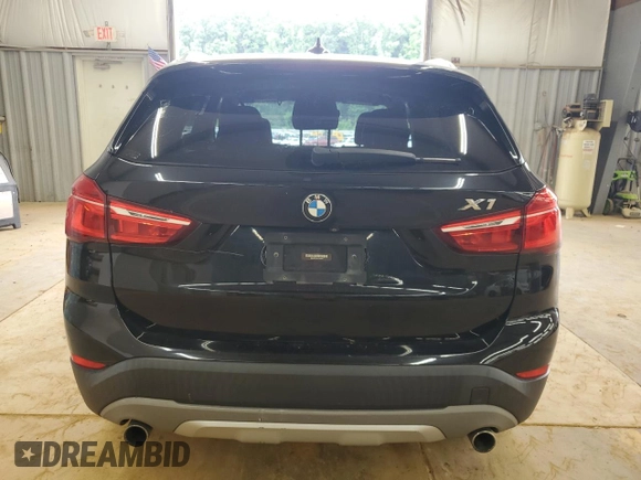 2018 BMW X1 xDrive28i with VIN WBXHT3C32J5F89449, listed as a Copart auction lot 64896595 with 108,804 mi miles and Clean title. Bid and sale history available at DreamBid. Image 6.