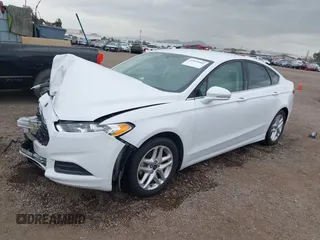2016 Ford Fusion SE with VIN 3FA6P0H74GR385232, listed as a IAAI auction lot 42035002 with 88,211 mi miles and . Bid and sale history available at DreamBid. Image 2.