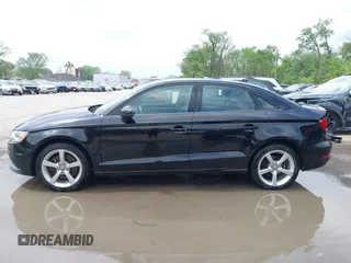 2015 Audi A3 Premium z VIN WAUBFGFF6F1009748, wystawiony jako IAAI lot #42123621 z przebiegiem 158 290 mil mil oraz . Historia ofert i sprzedaży dostępna na DreamBid. Obrazek 14.