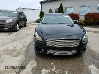 2014 Nissan Maxima SV с VIN 1N4AA5AP1EC441089, выставлен на аукционе Copart как лот 52320335 с пробегом 182 909 миль миль и Списание • Salvage title. История ставок и продаж доступна на DreamBid. Изображение 13.