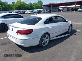 2014 Volkswagen CC R-Line с VIN WVWBP7AN7EE501064, выставлен на аукционе IAAI как лот 42220870 с пробегом Не указан миль и . История ставок и продаж доступна на DreamBid. Изображение 4.