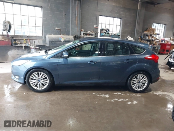 2018 Ford Focus Titanium with VIN 1FADP3N29JL242428, listed as a IAAI auction lot 42323967 with 200,662 mi miles and . Bid and sale history available at DreamBid. Image 14.
