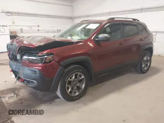 2019 Jeep Cherokee Trailhawk z VIN 1C4PJMBX0KD361981, wystawiony jako IAAI lot #42074093 z przebiegiem 56 989 mil mil oraz . Historia ofert i sprzedaży dostępna na DreamBid. Obrazek 17.