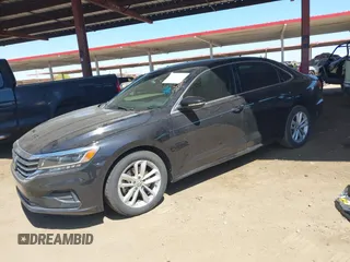 2020 Volkswagen Passat SE with VIN 1VWSA7A33LC006155, listed as a IAAI auction lot 42058034 with 94,827 mi miles and . Bid and sale history available at DreamBid. Image 2.
