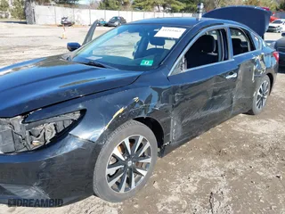 2018 Nissan Altima 2.5 SV with VIN 1N4AL3AP5JC265091, listed as a IAAI auction lot 41293465 with 102,343 mi miles. Bid and sale history available at carsss.com. Image 17.