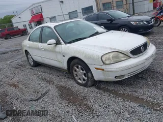 2003 Mercury Sable LS Premium with VIN 1MEFM55S93A622521, listed as a IAAI auction lot 41970248 with 216,534 mi miles. Bid and sale history available at carsss.com. Image 1.