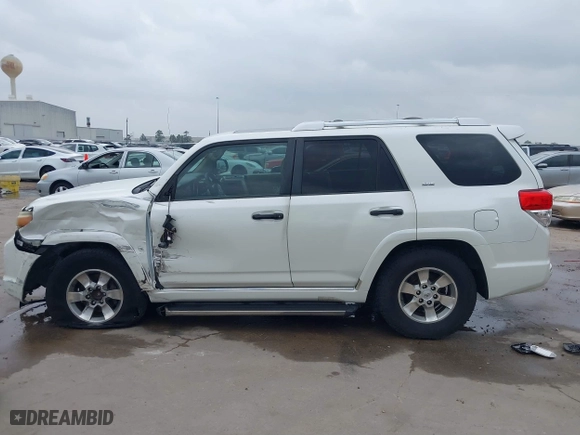 2011 Toyota 4Runner SR5 with VIN JTEZU5JR7B5014100, listed as a IAAI auction lot 41769637 with 215,474 mi miles. Bid and sale history available at carsss.com. Image 14.