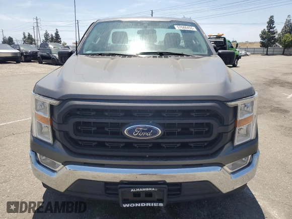 2021 Ford F-150 XL with VIN 1FTMF1C58MKE24095, listed as a Copart auction lot 57686455 with 60,583 mi miles and Salvage title. Bid and sale history available at DreamBid. Image 5.