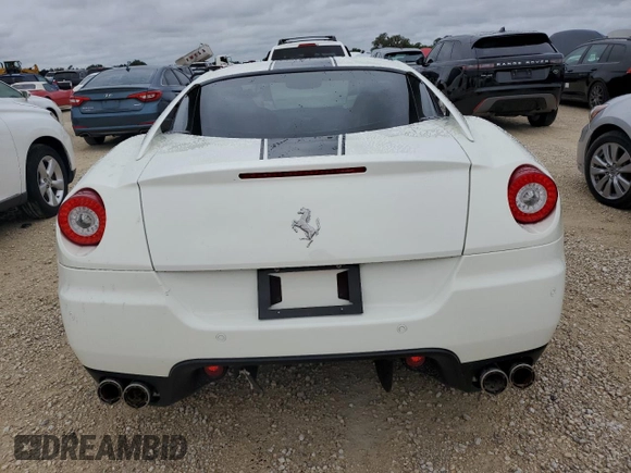 2010 Ferrari 599 z VIN ZFF60FCA0A0173683, wystawiony jako Copart lot #74913514 z przebiegiem Nie podano mil oraz Szkody całkowita. Historia ofert i sprzedaży dostępna na DreamBid. Obrazek 6.
