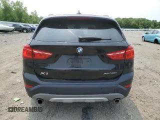2018 BMW X1 xDrive28i with VIN WBXHT3C36J3H29952, listed as a Copart auction lot 59679285 with 75,220 mi miles and Salvage title. Bid and sale history available at DreamBid. Image 6.
