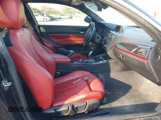 2015 BMW 2 Series 228i with VIN WBA1F5C58FV257021, listed as a IAAI auction lot 41318026 with 154,906 mi miles. Bid and sale history available at carsss.com. Image 5.