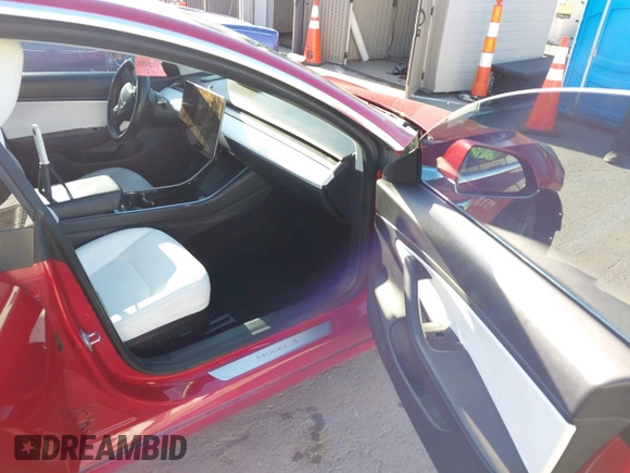 2020 Tesla Model 3 Long Range with VIN 5YJ3E1EB4LF668470, listed as a IAAI auction lot 41743651 with 151,957 mi miles. Bid and sale history available at carsss.com. Image 5.