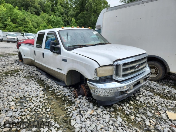 2001 Ford F-350 XL with VIN 1FTWW32F11EB16761, listed as a Copart auction lot 62511635 with 257,065 mi miles and Salvage title. Bid and sale history available at DreamBid. Image 4.
