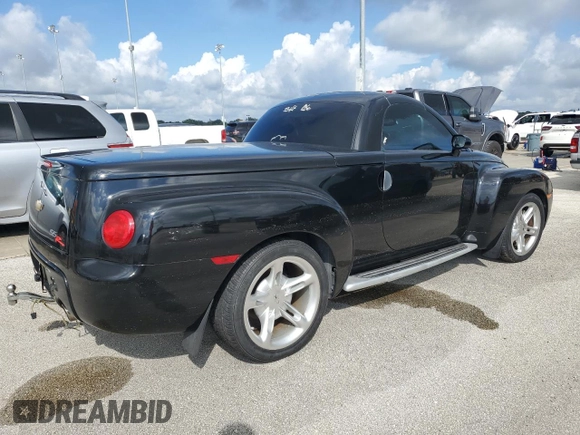 2003 Chevrolet SSR LS z VIN 1GCES14P73B101557, wystawiony jako Copart lot #73679984 z przebiegiem 107 554 mil mil oraz Szkoda całkowita • Salvage title. Historia ofert i sprzedaży dostępna na DreamBid. Obrazek 3.