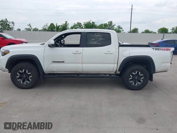2022 Toyota Tacoma SR z VIN 3TMCZ5AN7NM493268, wystawiony jako IAAI lot #42041593 z przebiegiem 100 589 mil mil oraz . Historia ofert i sprzedaży dostępna na DreamBid. Obrazek 14.