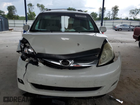 2010 Toyota Sienna XLE with VIN 5TDYK4CCXAS335064, listed as a Copart auction lot 62649665 with 246,327 mi miles and Salvage title. Bid and sale history available at DreamBid. Image 5.