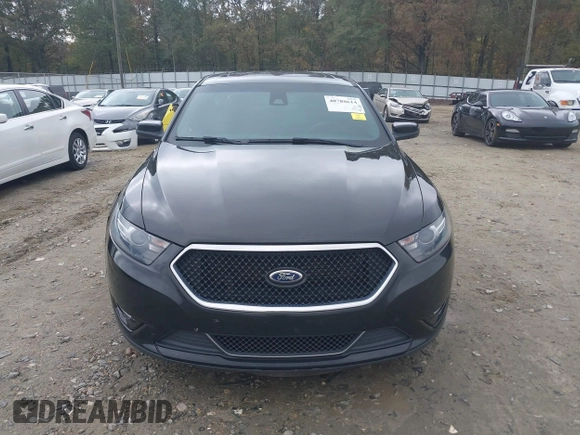 2015 Ford Taurus SHO with VIN 1FAHP2KT7FG148444, listed as a IAAI auction lot 40788614 with 121,533 mi miles and . Bid and sale history available at DreamBid. Image 12.