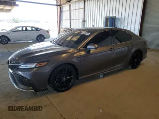 2021 Toyota Camry XSE with VIN 4T1KZ1AK1MU054521, listed as a Copart auction lot 55354095 with 57,123 mi miles and Salvage title. Bid and sale history available at DreamBid. Image 1.