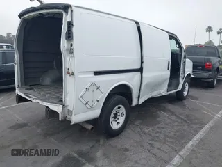 2012 GMC Savana Cargo Van with VIN 1GTW7FCA0C1191818, listed as a IAAI auction lot 41473004 with 184,779 mi miles. Bid and sale history available at carsss.com. Image 4.