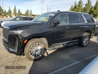 2023 Cadillac Escalade 4WD Premium Luxury z VIN 1GYS4BKL3PR373243, wystawiony jako Copart lot #47013125 z przebiegiem 21 122 mil mil oraz Szkody całkowita. Historia ofert i sprzedaży dostępna na DreamBid. Obrazek 1.