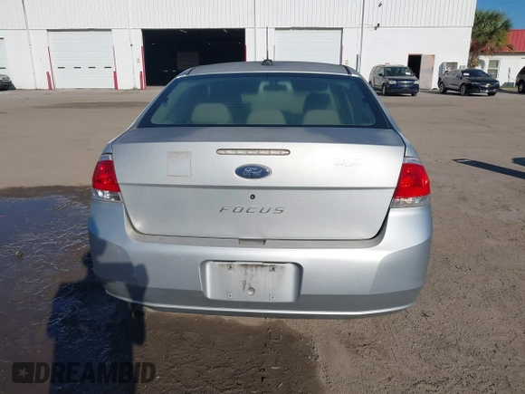 2009 Ford Focus S with VIN 1FAHP34N79W221813, listed as a IAAI auction lot 41758471 with 248,531 mi miles. Bid and sale history available at carsss.com. Image 16.