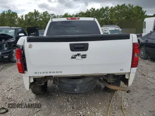 2013 Chevrolet Silverado 1500 LT with VIN 3GCPCSEA8DG237890, listed as a Copart auction lot 64668184 with 196,804 mi miles and Salvage Title. Bid and sale history available at DreamBid. Image 6.