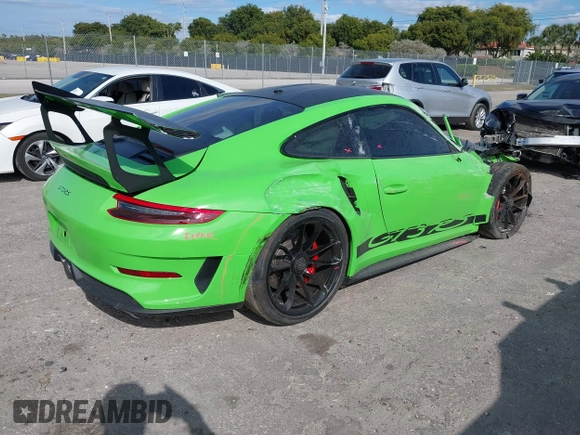 2019 Porsche 911 GT3 RS with VIN WP0AF2A94KS164340, listed as a IAAI auction lot 41319442 with 10,881 mi miles and . Bid and sale history available at DreamBid. Image 4.