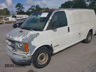 1998 Chevrolet Chevy Van z VIN 1GCFG15WXW1013981, wystawiony jako IAAI lot #42067738 z przebiegiem 265 287 mil mil oraz . Historia ofert i sprzedaży dostępna na DreamBid. Obrazek 2.