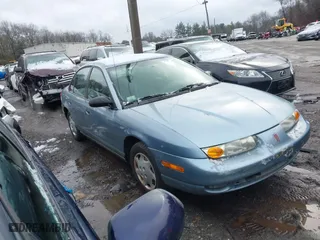 2002 Saturn SL with VIN 1G8ZH52802Z166379, listed as a IAAI auction lot 41020111 with 151,950 mi miles. Bid and sale history available at carsss.com. Image 1.