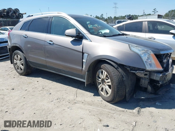 2012 Cadillac SRX Luxury Collection with VIN 3GYFNAE36CS509456, listed as a IAAI auction lot 41833647 with 119,931 mi miles and . Bid and sale history available at carsss.com. Image 1.