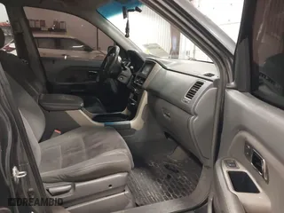 2006 Honda Pilot EX with VIN 2HKYF18466H504644, listed as a IAAI auction lot 41949350 with 256,464 mi miles. Bid and sale history available at carsss.com. Image 5.