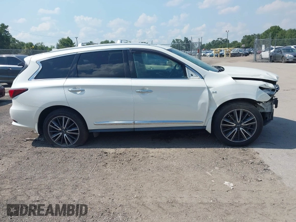 2019 Infiniti QX60 Pure with VIN 5N1DL0MN6KC508551, listed as a IAAI auction lot 42577741 with 130,937 mi miles and . Bid and sale history available at DreamBid. Image 12.
