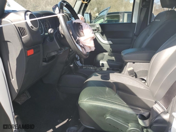 2017 Jeep Wrangler Unlimited Rubicon with VIN 1C4HJWFG9HL543266, listed as a Copart auction lot 50002055 with 50,223 mi miles and Salvage Title. Bid and sale history available at carsss.com. Image 7.