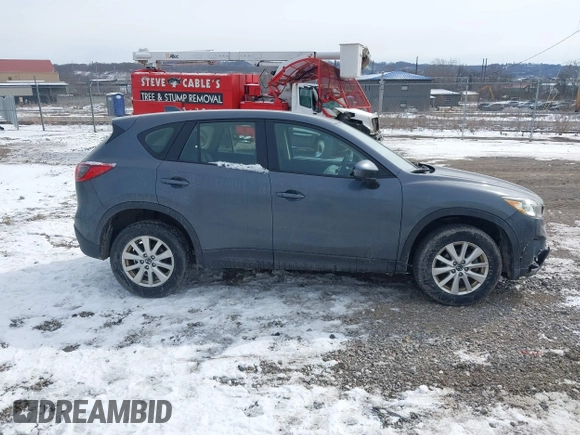 2013 Mazda CX-5 Sport z VIN JM3KE2BE9D0156274, wystawiony jako IAAI lot #41624466 z przebiegiem 159 017 mil mil oraz . Historia ofert i sprzedaży dostępna na DreamBid. Obrazek 13.