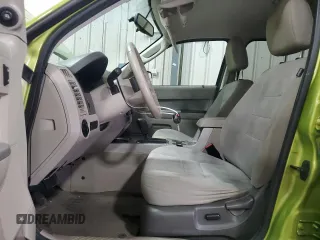 2012 Ford Escape XLT with VIN 1FMCU9D7XCKA07488, listed as a Copart auction lot 58605185 with 144,578 mi miles and Salvage title. Bid and sale history available at DreamBid. Image 7.