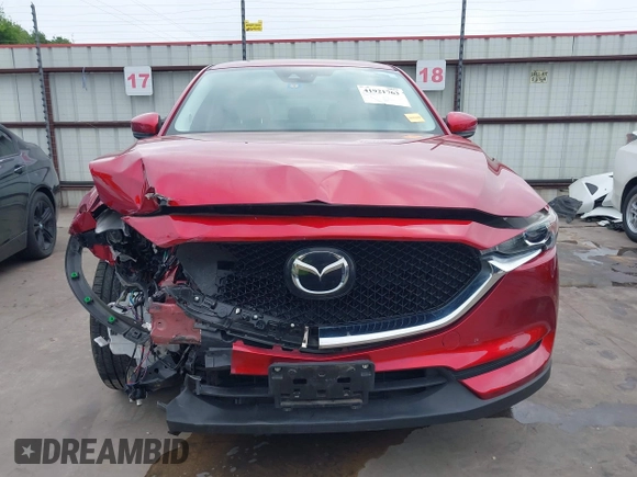 2019 Mazda CX-5 Touring with VIN JM3KFACM7K0696815, listed as a IAAI auction lot 41921763 with 46,900 mi miles. Bid and sale history available at carsss.com. Image 6.