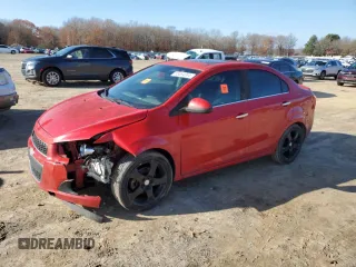 2013 Chevrolet Sonic LTZ z VIN 1G1JE5SH5D4127856, wystawiony jako Copart lot #85584884 z przebiegiem 129 770 mil mil oraz Szkoda całkowita • Salvage title. Historia ofert i sprzedaży dostępna na DreamBid. Obrazek 1.