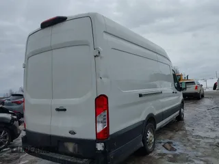 2023 Ford Transit Cargo with VIN 1FTBR3U80PKA40125, listed as a IAAI auction lot 41709473 with 83,626 mi miles and . Bid and sale history available at DreamBid. Image 4.