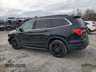 2021 Honda Pilot Special Edition with VIN 5FNYF6H24MB029437, listed as a Copart auction lot 48829155 with 60,875 mi miles and Salvage Title. Bid and sale history available at DreamBid. Image 2.