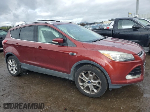 2016 Ford Escape Titanium with VIN 1FMCU9J91GUA99767, listed as a Copart auction lot 51172655 with 132,911 mi miles and Salvage title. Bid and sale history available at DreamBid. Image 4.