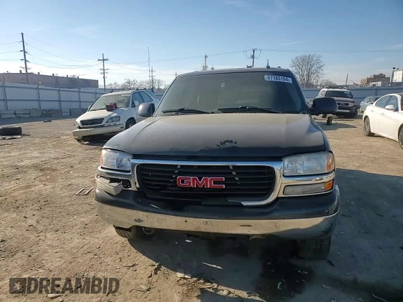 2004 GMC Yukon SLT with VIN 1GKEK13Z04R127059, listed as a Copart auction lot 87185164 with 159,667 mi miles and Salvage Title. Bid and sale history available at carsss.com. Image 12.