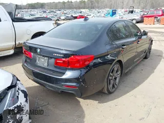 2018 BMW 5 Series M550i xDrive with VIN WBAJB9C50JB036400, listed as a IAAI auction lot 41464278 with 139,079 mi miles and . Bid and sale history available at DreamBid. Image 4.