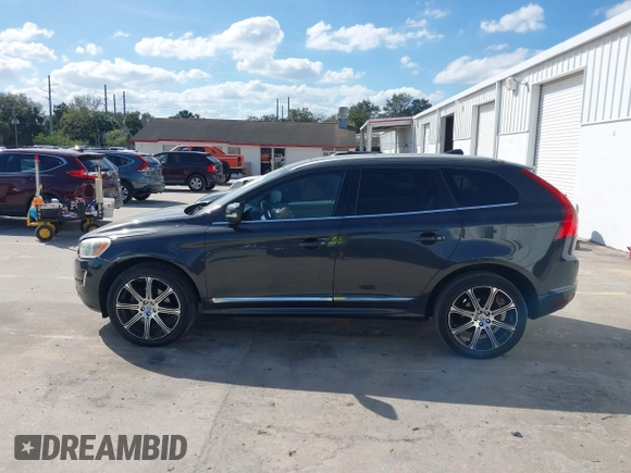 2015 Volvo XC60 T5 Drive-E Premier Plus with VIN YV440MDC7F2606774, listed as a IAAI auction lot 41564034 with 166,758 mi miles. Bid and sale history available at carsss.com. Image 14.