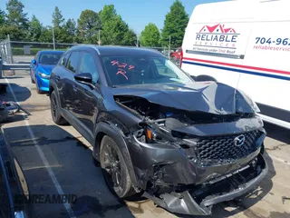 2025 Mazda CX-50 2.5 S Preferred Package with VIN 7MMVABBM5SN305546, listed as a IAAI auction lot 42225558 with 23,516 mi miles. Bid and sale history available at carsss.com. Image 1.