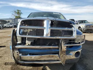2005 Dodge 2500 SLT z VIN 3D7KS28C85G834667, wystawiony jako Copart lot #55074255 z przebiegiem 115 912 mil mil oraz Szkoda całkowita • Salvage title. Historia ofert i sprzedaży dostępna na DreamBid. Obrazek 5.