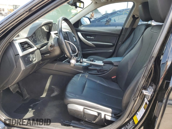 2014 BMW 3 Series 320i xDrive with VIN WBA3C3G51ENS72023, listed as a Copart auction lot 58595225 with 104,315 mi miles and Salvage title. Bid and sale history available at DreamBid. Image 7.