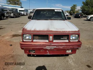 1991 Oldsmobile Bravada z VIN 1GHDT13Z0M2705443, wystawiony jako Copart lot #77072004 z przebiegiem Nie podano mil oraz Tytuł czysty. Historia ofert i sprzedaży dostępna na DreamBid. Obrazek 5.